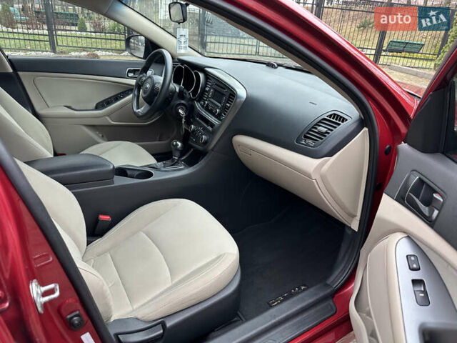 Красный Киа Оптима, объемом двигателя 2.36 л и пробегом 189 тыс. км за 8850 $, фото 16 на Automoto.ua