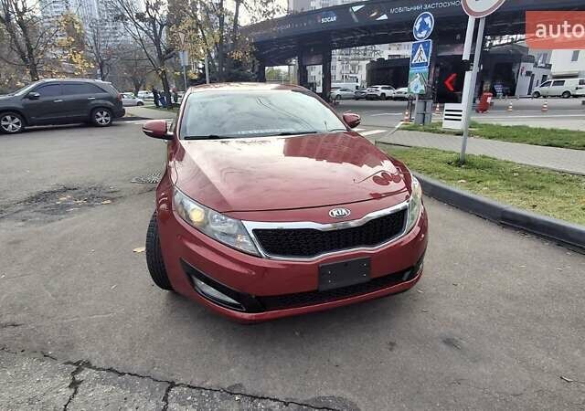 Червоний Кіа Оптіма, об'ємом двигуна 2.36 л та пробігом 145 тис. км за 9200 $, фото 1 на Automoto.ua