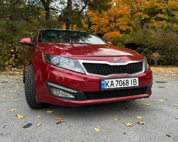 Красный Киа Оптима, объемом двигателя 2 л и пробегом 195 тыс. км за 9700 $, фото 9 на Automoto.ua