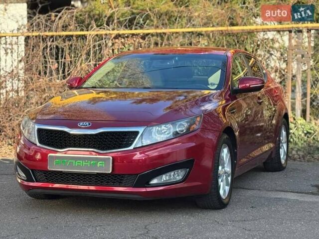 Красный Киа Оптима, объемом двигателя 2.4 л и пробегом 145 тыс. км за 9000 $, фото 2 на Automoto.ua