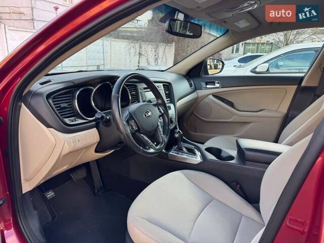 Красный Киа Оптима, объемом двигателя 2.4 л и пробегом 145 тыс. км за 9000 $, фото 7 на Automoto.ua