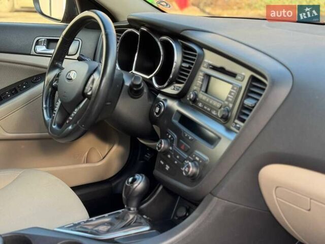 Красный Киа Оптима, объемом двигателя 2.4 л и пробегом 145 тыс. км за 9000 $, фото 9 на Automoto.ua