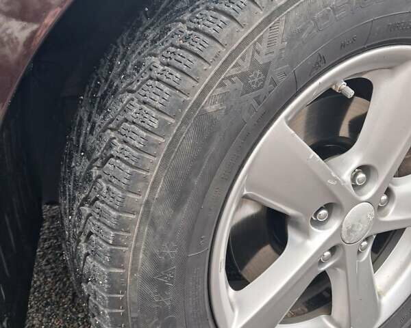 Красный Киа Оптима, объемом двигателя 2.4 л и пробегом 290 тыс. км за 8000 $, фото 5 на Automoto.ua