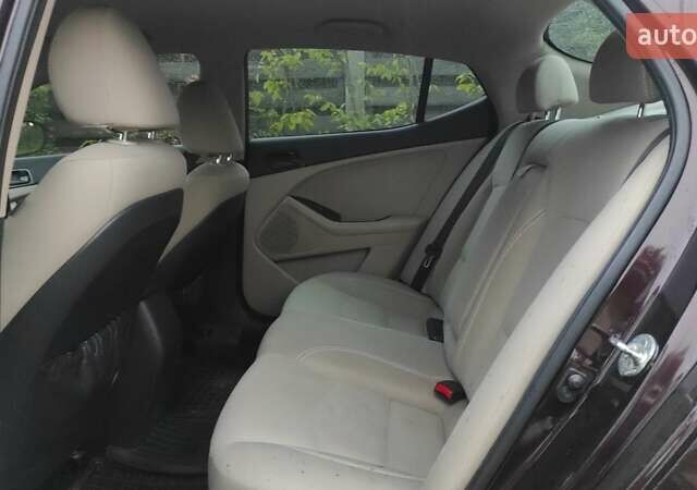 Червоний Кіа Оптіма, об'ємом двигуна 2.36 л та пробігом 290 тис. км за 8000 $, фото 6 на Automoto.ua