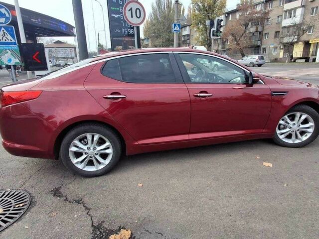 Червоний Кіа Оптіма, об'ємом двигуна 2.4 л та пробігом 145 тис. км за 9200 $, фото 4 на Automoto.ua