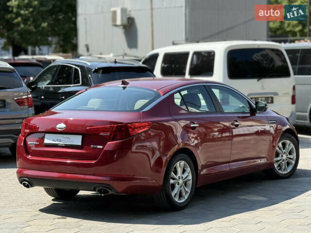 Червоний Кіа Оптіма, об'ємом двигуна 2.36 л та пробігом 198 тис. км за 9900 $, фото 26 на Automoto.ua
