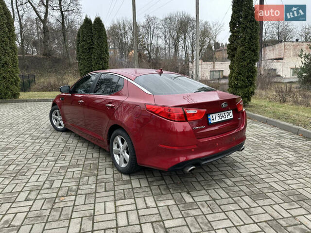 Красный Киа Оптима, объемом двигателя 2.36 л и пробегом 189 тыс. км за 8850 $, фото 4 на Automoto.ua