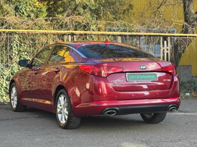 Красный Киа Оптима, объемом двигателя 2.4 л и пробегом 145 тыс. км за 9000 $, фото 5 на Automoto.ua