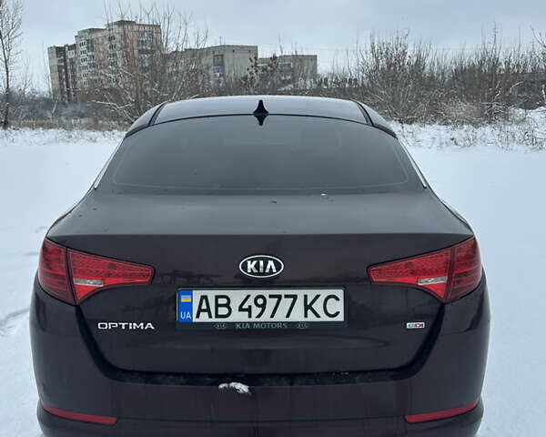 Красный Киа Оптима, объемом двигателя 2.36 л и пробегом 230 тыс. км за 8200 $, фото 4 на Automoto.ua