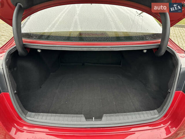 Красный Киа Оптима, объемом двигателя 2.36 л и пробегом 189 тыс. км за 8850 $, фото 5 на Automoto.ua