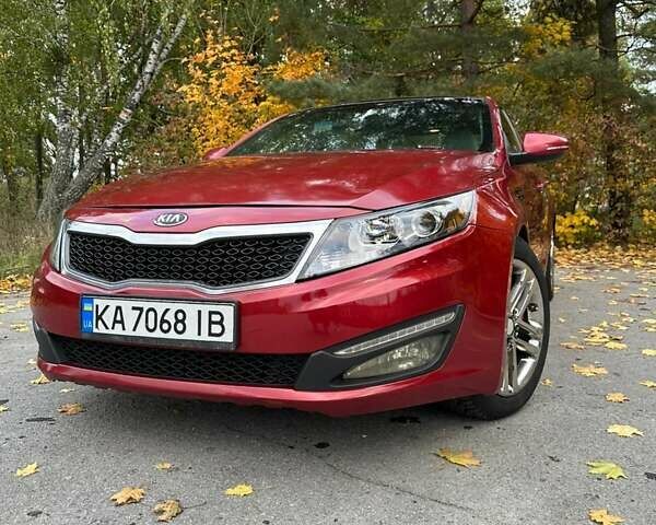 Красный Киа Оптима, объемом двигателя 2 л и пробегом 195 тыс. км за 9700 $, фото 2 на Automoto.ua