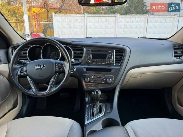 Красный Киа Оптима, объемом двигателя 2.4 л и пробегом 145 тыс. км за 9000 $, фото 10 на Automoto.ua