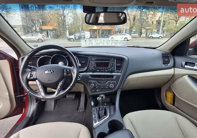 Червоний Кіа Оптіма, об'ємом двигуна 2.36 л та пробігом 145 тис. км за 9200 $, фото 13 на Automoto.ua