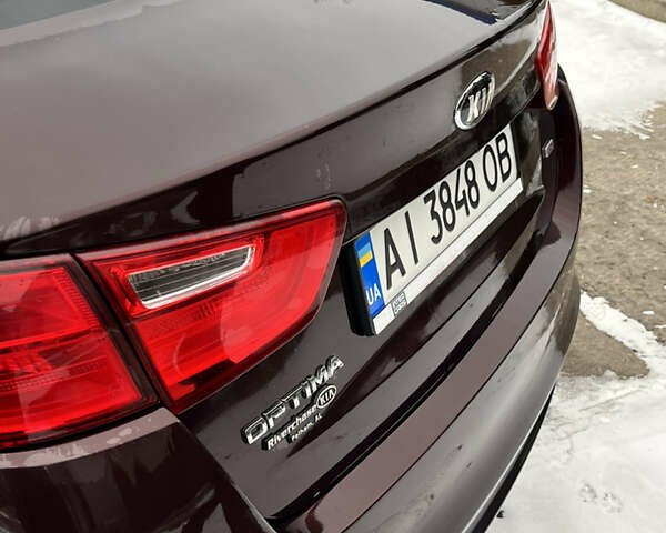 Червоний Кіа Оптіма, об'ємом двигуна 2.4 л та пробігом 223 тис. км за 9900 $, фото 5 на Automoto.ua