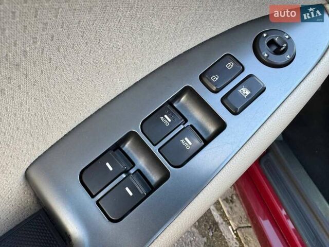 Красный Киа Оптима, объемом двигателя 2.4 л и пробегом 145 тыс. км за 9000 $, фото 13 на Automoto.ua