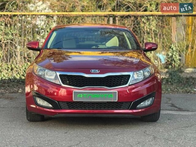 Красный Киа Оптима, объемом двигателя 2.4 л и пробегом 145 тыс. км за 9000 $, фото 3 на Automoto.ua