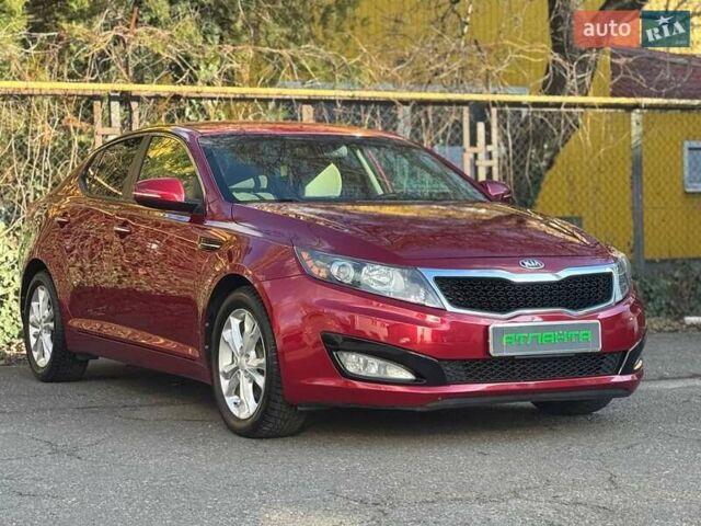 Красный Киа Оптима, объемом двигателя 2.4 л и пробегом 145 тыс. км за 9000 $, фото 1 на Automoto.ua