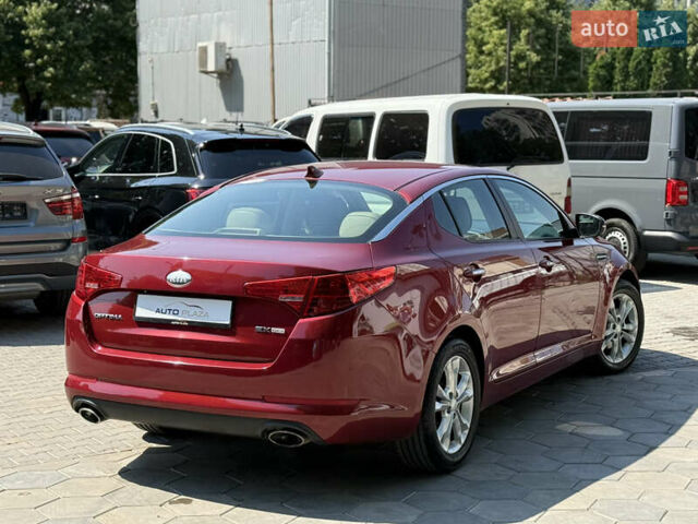 Червоний Кіа Оптіма, об'ємом двигуна 2.36 л та пробігом 198 тис. км за 9900 $, фото 22 на Automoto.ua