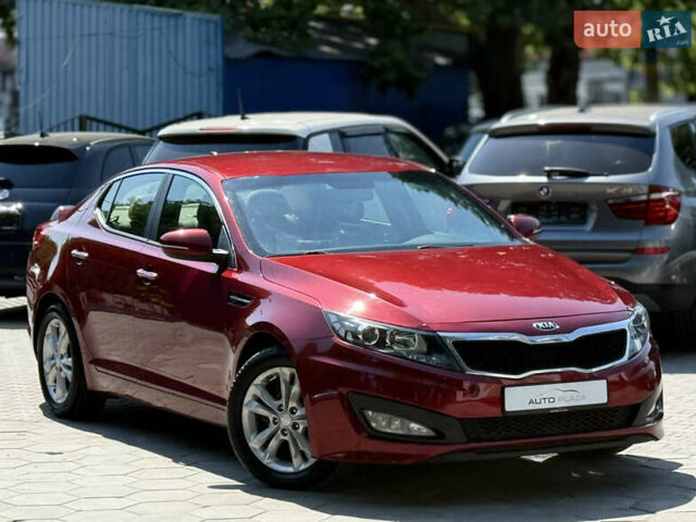 Червоний Кіа Оптіма, об'ємом двигуна 2.36 л та пробігом 198 тис. км за 9900 $, фото 18 на Automoto.ua