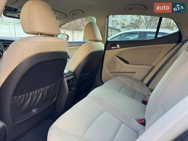 Красный Киа Оптима, объемом двигателя 2.4 л и пробегом 145 тыс. км за 9000 $, фото 11 на Automoto.ua