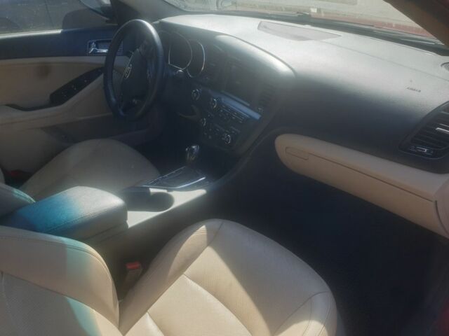 Красный Киа Оптима, объемом двигателя 2.4 л и пробегом 240 тыс. км за 8700 $, фото 2 на Automoto.ua