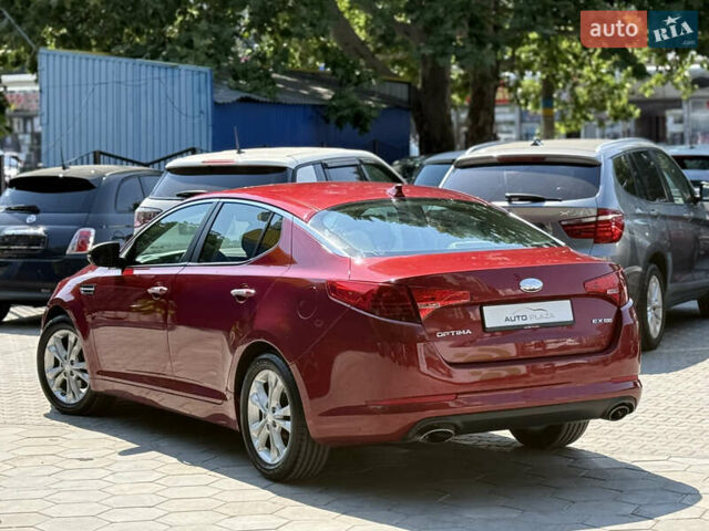 Червоний Кіа Оптіма, об'ємом двигуна 2.36 л та пробігом 198 тис. км за 9900 $, фото 36 на Automoto.ua