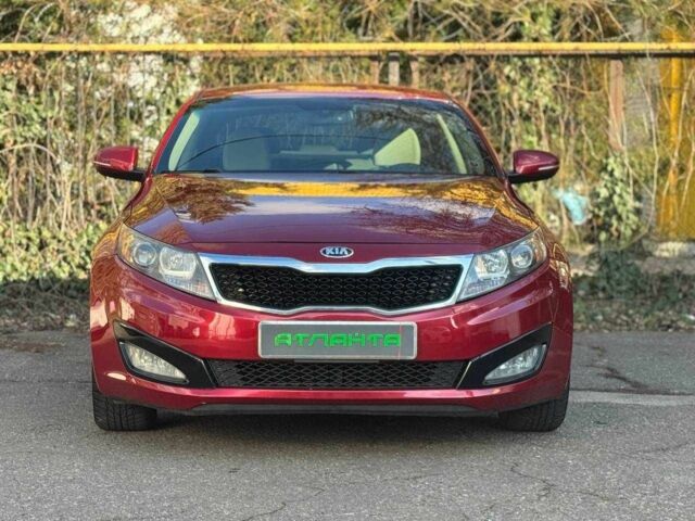 Красный Киа Оптима, объемом двигателя 2.4 л и пробегом 145 тыс. км за 9000 $, фото 3 на Automoto.ua