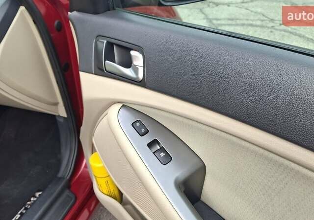 Червоний Кіа Оптіма, об'ємом двигуна 2.36 л та пробігом 145 тис. км за 9200 $, фото 12 на Automoto.ua