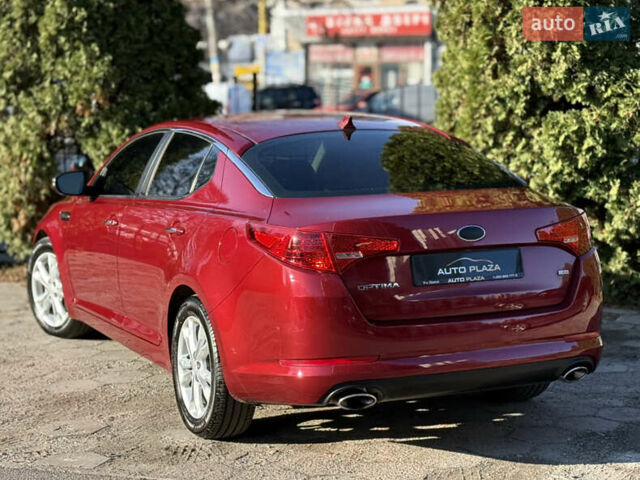 Красный Киа Оптима, объемом двигателя 2.36 л и пробегом 183 тыс. км за 8500 $, фото 31 на Automoto.ua