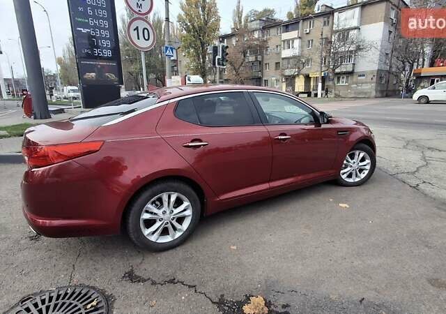 Червоний Кіа Оптіма, об'ємом двигуна 2.36 л та пробігом 145 тис. км за 9200 $, фото 3 на Automoto.ua