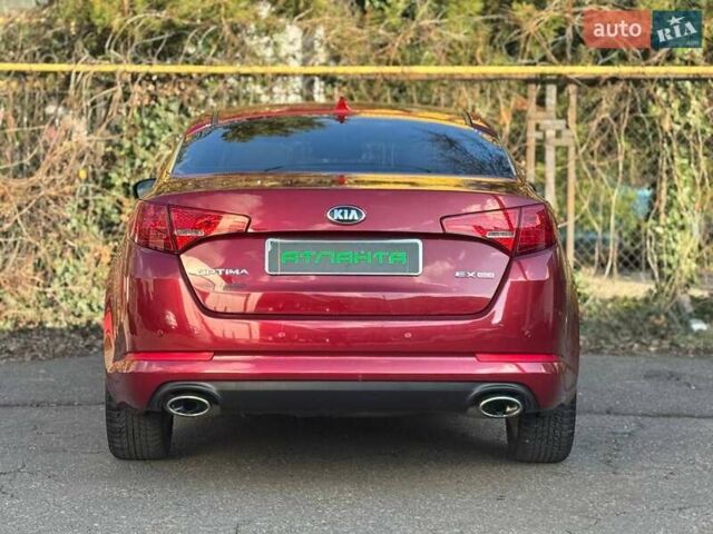 Красный Киа Оптима, объемом двигателя 2.4 л и пробегом 145 тыс. км за 9000 $, фото 6 на Automoto.ua