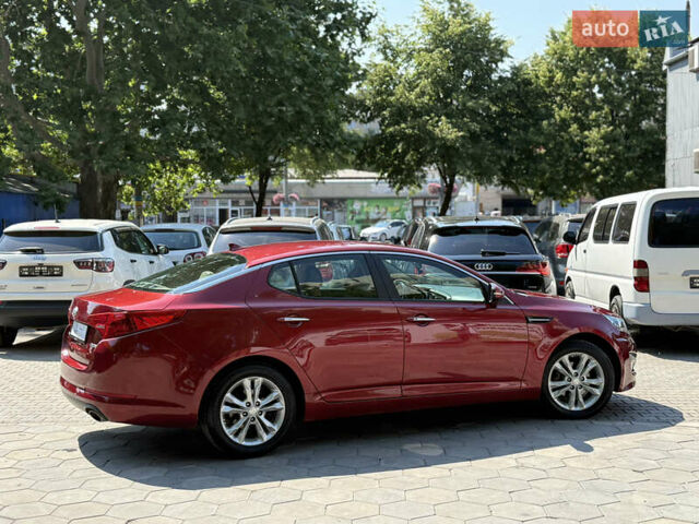 Червоний Кіа Оптіма, об'ємом двигуна 2.36 л та пробігом 198 тис. км за 9900 $, фото 24 на Automoto.ua