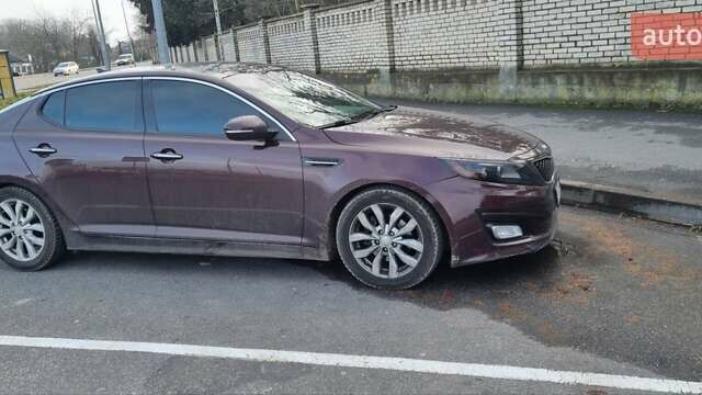 Червоний Кіа Оптіма, об'ємом двигуна 2.4 л та пробігом 170 тис. км за 8200 $, фото 1 на Automoto.ua