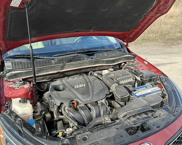 Червоний Кіа Оптіма, об'ємом двигуна 2.36 л та пробігом 177 тис. км за 9000 $, фото 4 на Automoto.ua