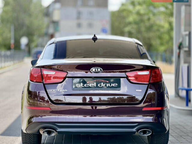 Червоний Кіа Оптіма, об'ємом двигуна 2.4 л та пробігом 184 тис. км за 9499 $, фото 4 на Automoto.ua