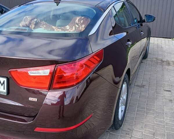 Красный Киа Оптима, объемом двигателя 2.4 л и пробегом 220 тыс. км за 7500 $, фото 2 на Automoto.ua