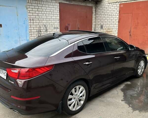 Красный Киа Оптима, объемом двигателя 2.36 л и пробегом 142 тыс. км за 10800 $, фото 4 на Automoto.ua