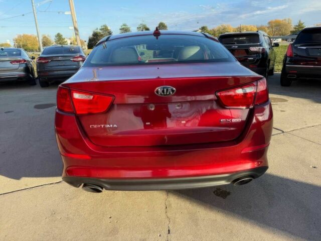 Красный Киа Оптима, объемом двигателя 2.4 л и пробегом 83 тыс. км за 5000 $, фото 6 на Automoto.ua