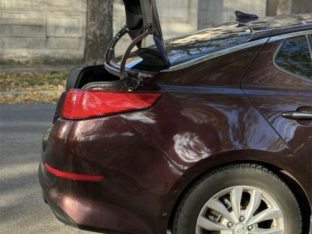 Красный Киа Оптима, объемом двигателя 2.4 л и пробегом 116 тыс. км за 9000 $, фото 6 на Automoto.ua