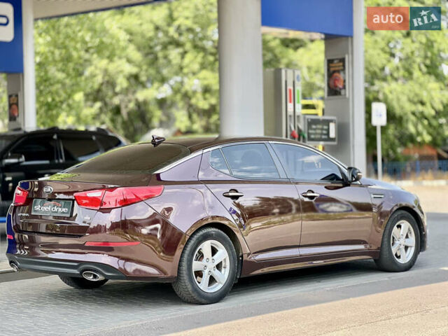 Червоний Кіа Оптіма, об'ємом двигуна 2.4 л та пробігом 184 тис. км за 9499 $, фото 6 на Automoto.ua