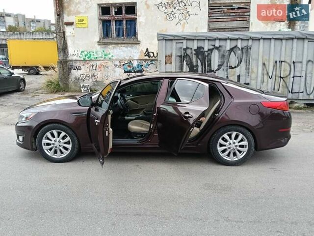 Червоний Кіа Оптіма, об'ємом двигуна 2.36 л та пробігом 120 тис. км за 10200 $, фото 7 на Automoto.ua