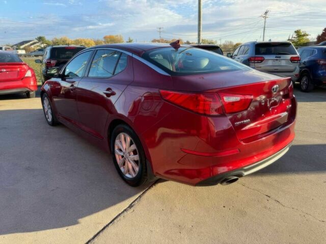 Красный Киа Оптима, объемом двигателя 2.4 л и пробегом 83 тыс. км за 5000 $, фото 7 на Automoto.ua