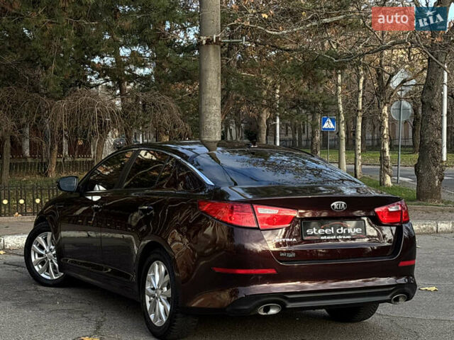 Червоний Кіа Оптіма, об'ємом двигуна 2.36 л та пробігом 116 тис. км за 9999 $, фото 3 на Automoto.ua