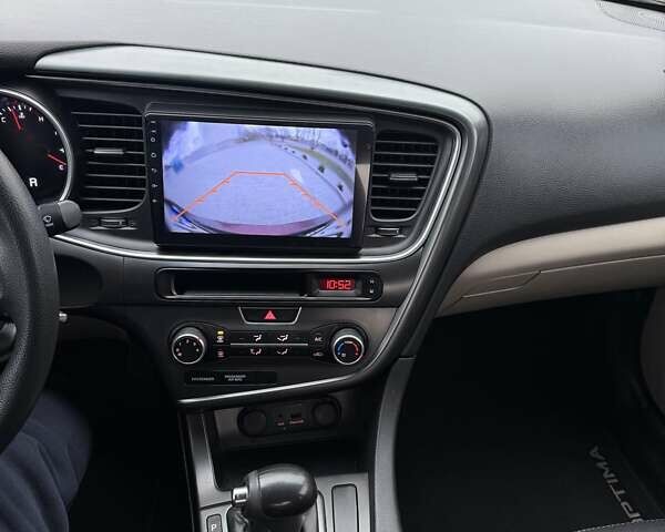 Красный Киа Оптима, объемом двигателя 2.4 л и пробегом 170 тыс. км за 9800 $, фото 7 на Automoto.ua