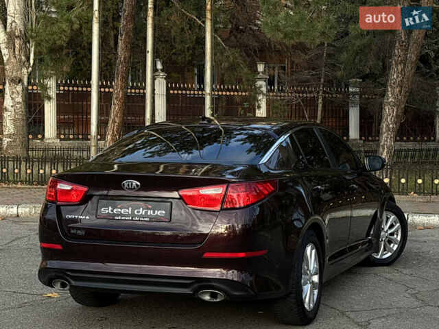 Червоний Кіа Оптіма, об'ємом двигуна 2.36 л та пробігом 116 тис. км за 9999 $, фото 2 на Automoto.ua