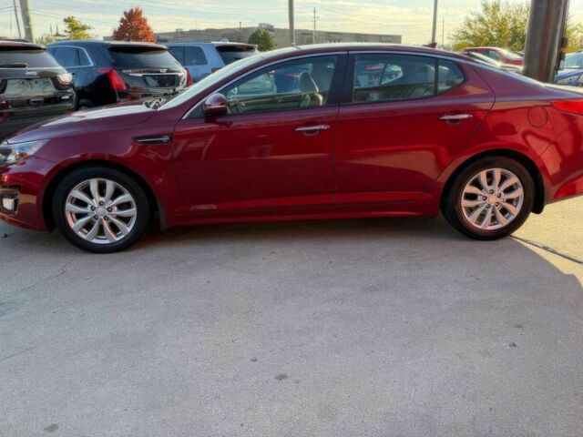 Красный Киа Оптима, объемом двигателя 2.4 л и пробегом 83 тыс. км за 5000 $, фото 3 на Automoto.ua