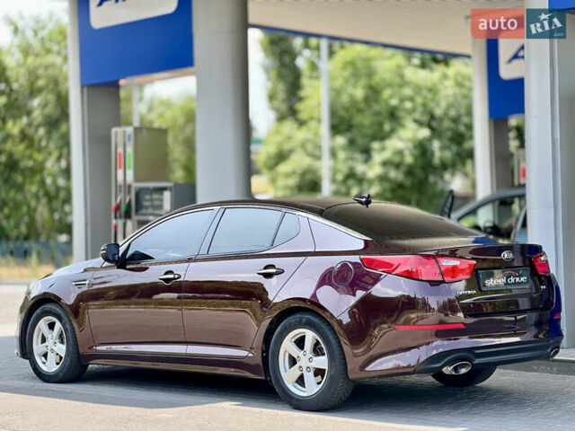 Червоний Кіа Оптіма, об'ємом двигуна 2.4 л та пробігом 184 тис. км за 9499 $, фото 3 на Automoto.ua
