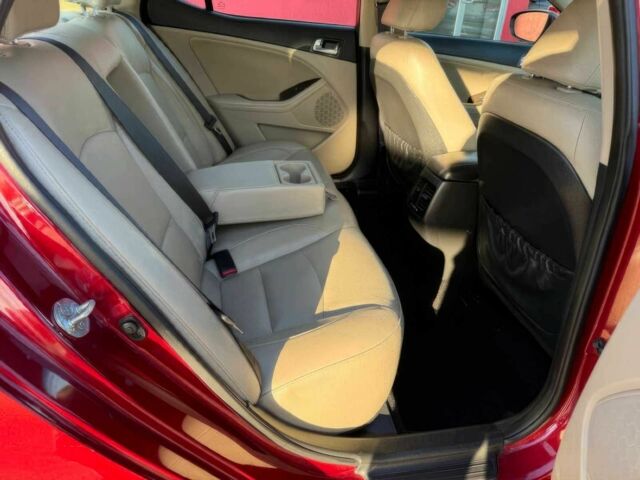 Красный Киа Оптима, объемом двигателя 2.4 л и пробегом 83 тыс. км за 5000 $, фото 10 на Automoto.ua