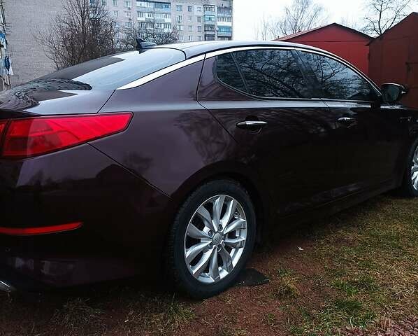 Красный Киа Оптима, объемом двигателя 2.4 л и пробегом 78 тыс. км за 11000 $, фото 7 на Automoto.ua