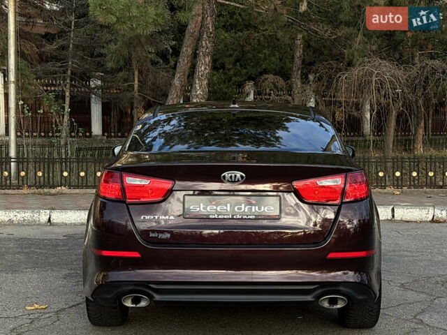 Червоний Кіа Оптіма, об'ємом двигуна 2.36 л та пробігом 116 тис. км за 9999 $, фото 6 на Automoto.ua